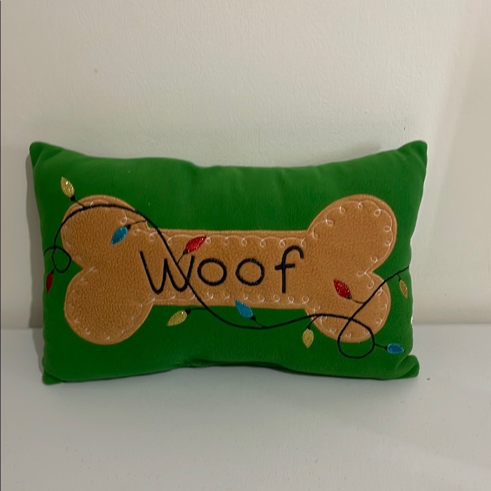 Green Dog Bone Pillow with 'Woof' Design